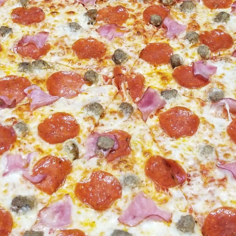 Indulge in Our Meat Lovers Pizza